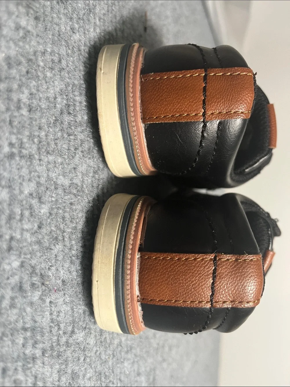 Black Oxford Lace-Up Shoes with Tan Accents. Small scuff mark on toe bed.